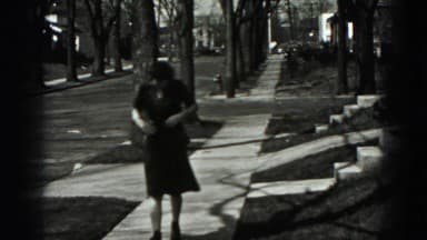 1946: Harrisburg PA. A Black And White Photo Of A Woman In A Dress.