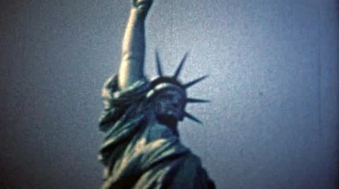 1954: Statue of Liberty and the New York City skyline view.