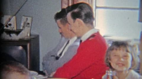 1965: Large Family of Youngsters Sitting Around the Golden Television