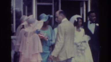 1975: Bronx, New York, USA. A Little Girl In A Red And Purple Dress.