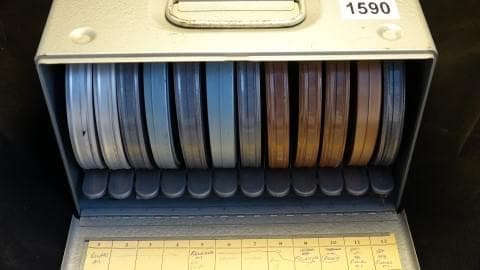 Lockbox case of 8mm films of 7inch 8mm reels.