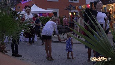 Colorado, United States: Mom & Daughter Watching the Street Halloween Events