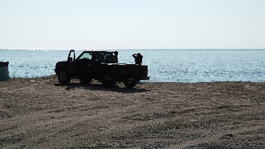 Friends Chilling by the Ocean
