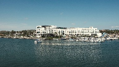 A White Elegant Hotel by the Ocean