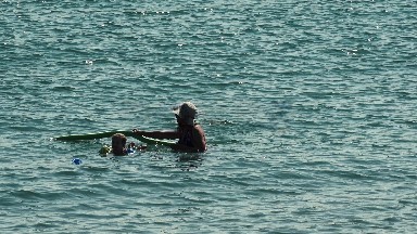 Mother & Son Playing in the Middle of the Sea