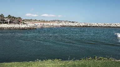 Smaller Charter Yacht Passing by