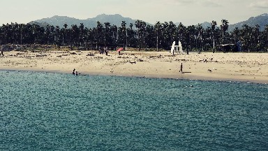 People Chilling on Beach in Los Cabos