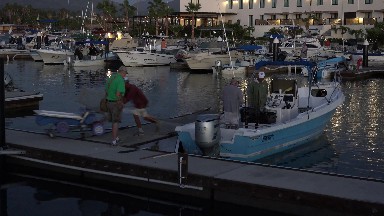 Grandfather Prepares to Ride A Passenger Boat