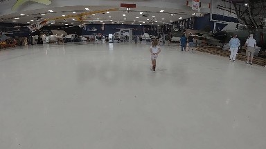 Little Girl Walking Inside a Museum