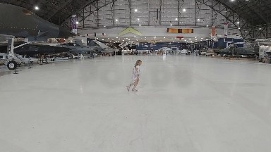 Little Girl running Through Airplane Museum. Denver, Colorado.