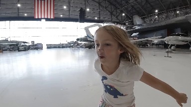 Little Girl Falling Over. Denver, Colorado