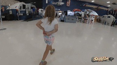 Young Girl Walking Through Museum. Denver, Colorado.