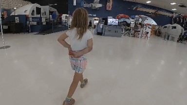 Young Girl Walking Through Museum. Denver, Colorado.