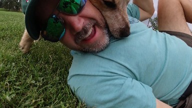 Man Wrestling With Dog. Denver, Colorado.