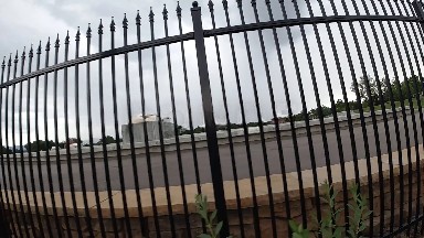 Water Treatment Basin Behind Fence. Denver, Colorado.