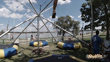 Little Girl Strapped Into Trampoline Jumper. Denver, Colorado.