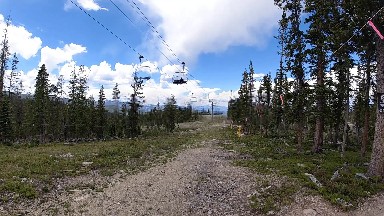 View Of A Ski Lift Going Up A Hill