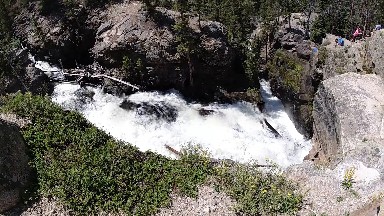 River That Is Running Through A Rocky Area