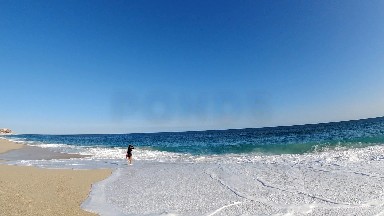 Standing On The Beach Looking Out At The Ocean