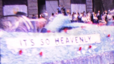 Indiana, USA. 1963: West Virginia state banner in festive street parade