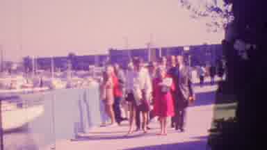 Honolulu Hawaii USA (1964): Couples Walking Along Waterfront Looking At Boats