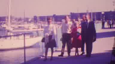 Honolulu Hawaii USA (1964): Woman In Red Skirt And White Shirt Gesturing Toward A