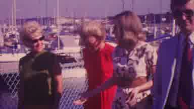 Honolulu Hawaii USA (1964): People Walking And Talking Next To A Marina Full Of
