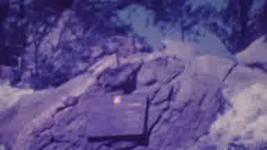 Palm Springs California USA (1964): American Flag Blowing Over A Memory Plate