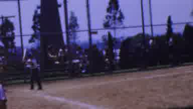 Disneyland Los Angeles California USA (1964): Softball Player Up At Bat Hits A