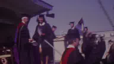 Los Angeles USA (1965): People Excepting A Diploma On Stage