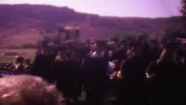 Los Angeles USA (1965): Graduating Students Walk Through A Crowded Ceremony In Cap