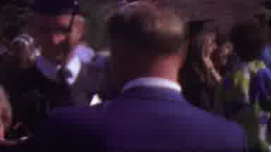 Los Angeles USA (1965): Graduate Standing Outside After Graduation Greeting People