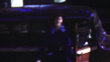 Wisconsin USA-1954: Two Women Exiting Vintage Car At Night In Nostalgic 8mm Footage