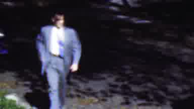 Wisconsin USA (1954): Man In Blue Suit Walks To His House And Greets His Wife And