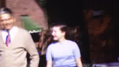 Wisconsin USA (1954): A Man Bumps Into A Woman While Walking Next To Her