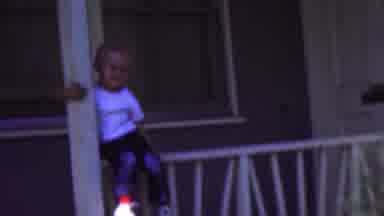 Wisconsin USA (1954): Little Boy Sitting And Standing By The House's Front Porch