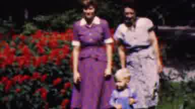 Wisconsin USA (1954): Two Women And Small Child By Flowers