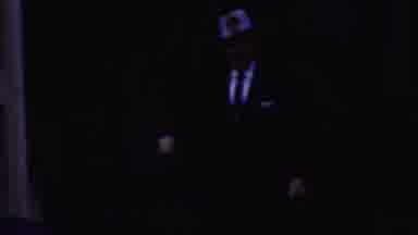 California USA-1961: White Male Wearing Suit And Cowboy Hat Walking With Coffee