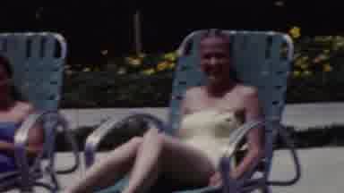California USA (1961): Women In Swimming Costumes Enjoying Some Poolside Frolics