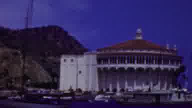 California USA (1961): A View Of Some Unique Building Being Filmed From A Boat On