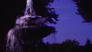 Wisconsin USA-1954: Tiered Fountain Pouring Water in Purple Light