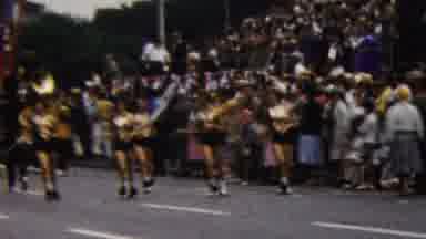 California USA-1961: Marching Band and Cheerleaders in Parade