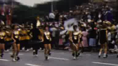 California USA-1961: Parade Of People Walking Carrying Sign