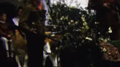 California USA (1961): Pioneer Life Displayed On A Daytime Parade Float In The