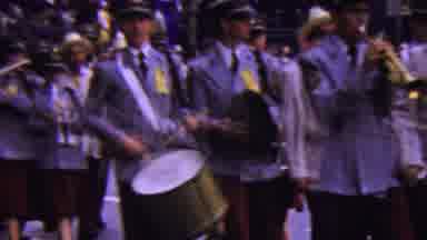 California USA (1961): New England Marching Band Performing In A Parade