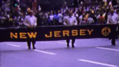 California USA (1961): Parade With New Jersey Sign In Front Of Skyscraper