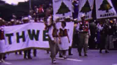 California USA (1961): People Marching With Banners And Flags Through City Street