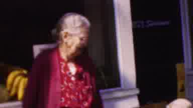 Wisconsin USA-1954: Grandmother Showing Off Baby In Front Of Store