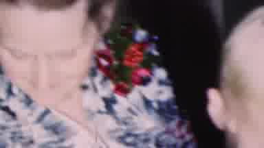 Here's to awkward Christmas photos with grandma and the tiny human she found on sale