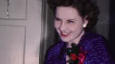 Cleveland Ohio USA (1953): Lady Is Smiling Wearing A Blue Dress,Corsage,Sitting